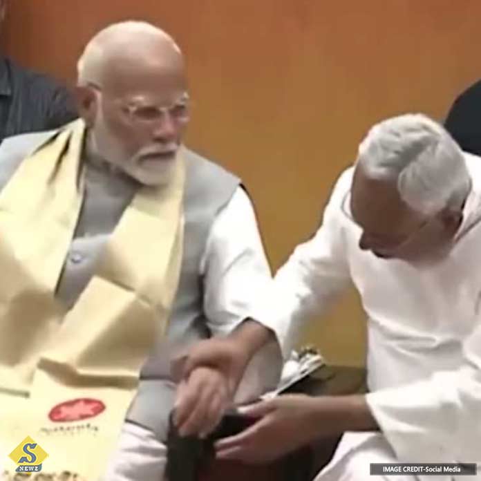 Nitishs test holding Modis hand netizens laughter
