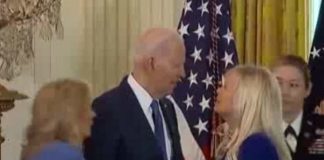 স্ত্রী ভেবে অন্য মহিলাকে চুম্বনে উদ্যত বাইডেন Biden pretends to kiss another woman thinking he is his wife