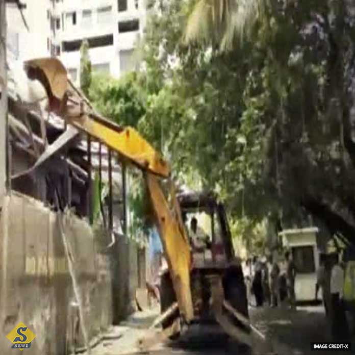 Bulldozer in the bar suspended Rajesh