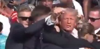 সভায় বন্দুকবাজের হামলায় রক্তাক্ত ট্রাম্প Trump is bloodied by the gunmans attack at the meeting