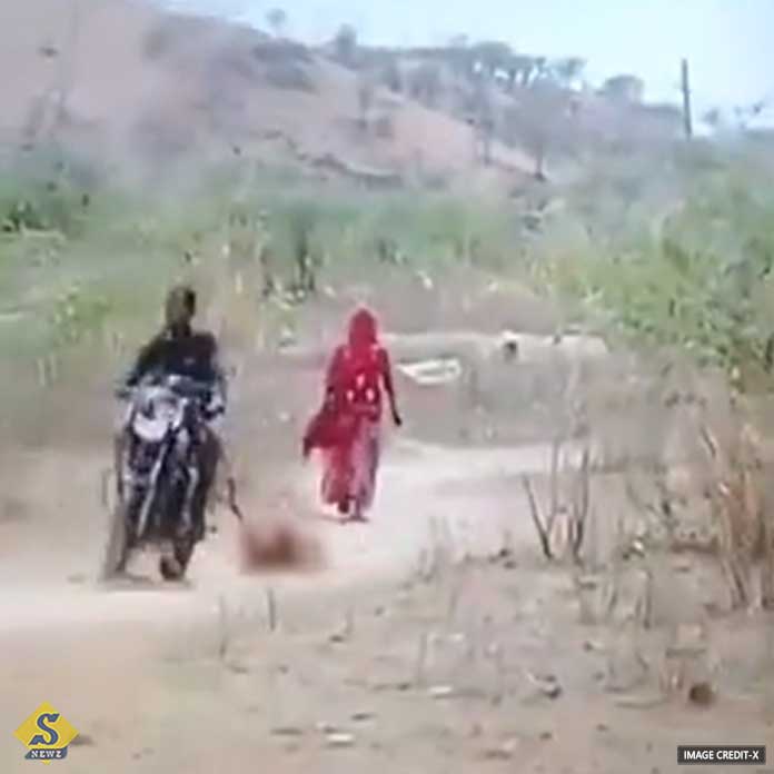 The husband tied his wife to the bike and went around the village