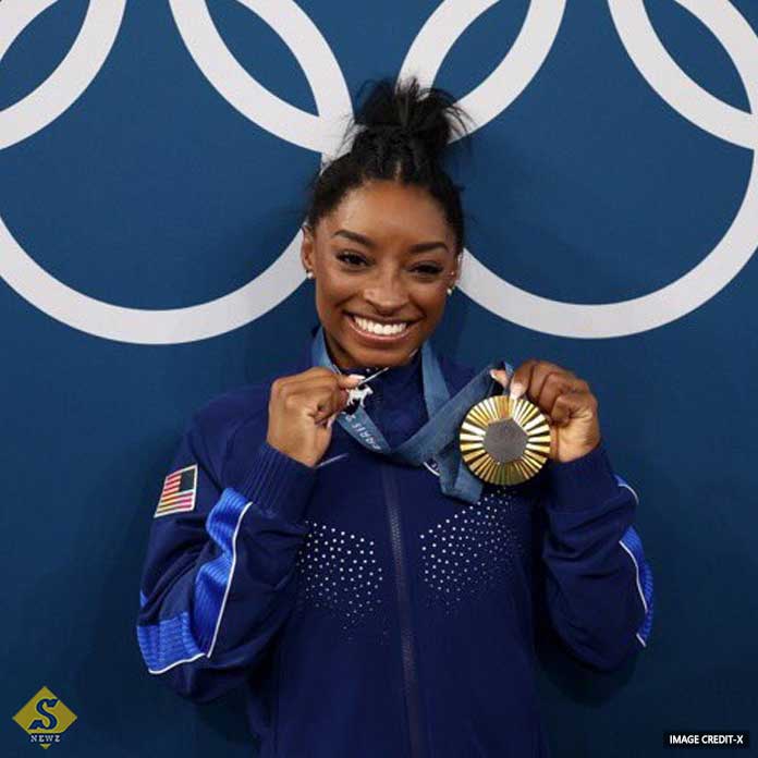 Third gold win Biles Mania in Paris