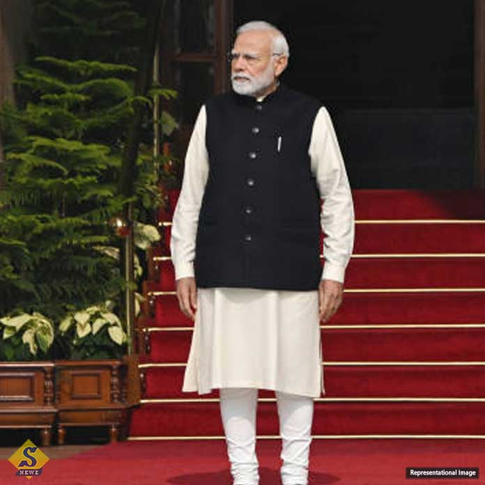Modi-takes-dip-in-Kumbh-Mela-on-Delhi-election-day