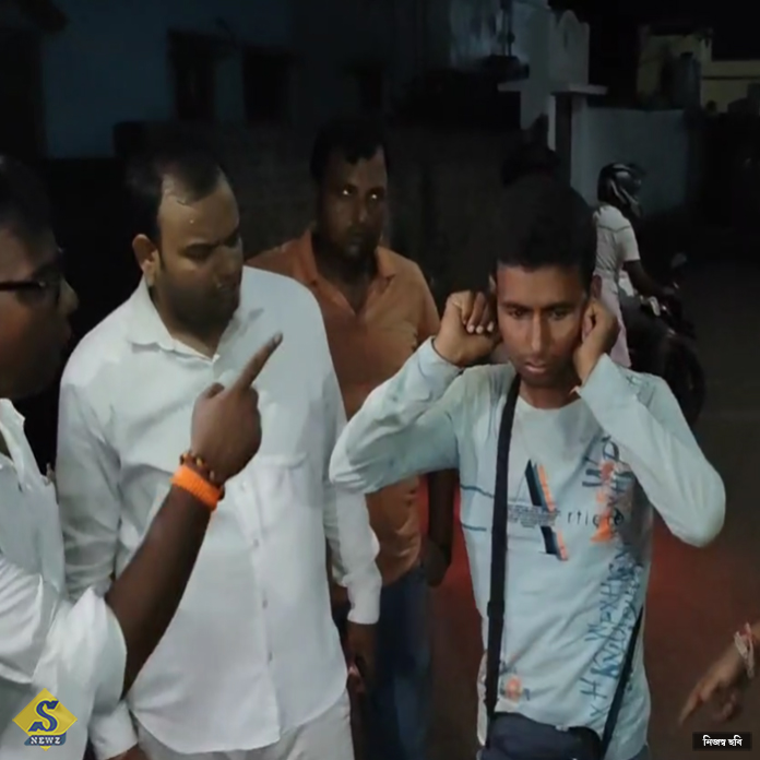Anti-India-slogans-on-Facebook,-BJP-hands-over-youth-to-police-after-making-him-stand-on-top-of-Pakistani-flag